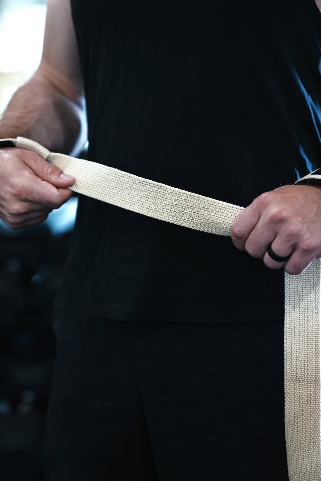 Lifting straps for deadlifts: Bay Gear Co. lasso straps wrapped on a barbell.